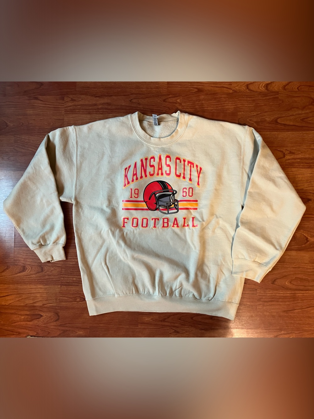Gildan Cream Crewneck Sweatshirt with Red Football Helmet Graphic